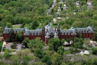 Once St. Vincent’s Sanitarium, the historic property continues today as affordable housing after a $27.3 million acquisition and rehabilitation.