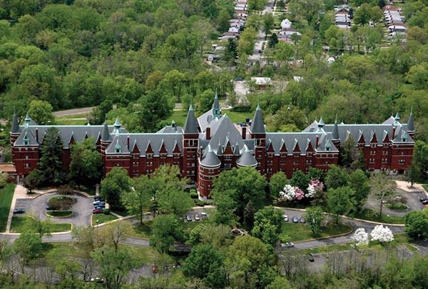 Once St. Vincent’s Sanitarium, the historic property continues today as affordable housing after a $27.3 million acquisition and rehabilitation.