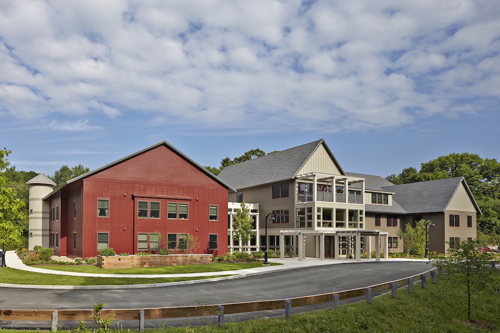Peter Shaffer, a principal of DiMella Shaffer Architects, drove around the town of Carlisle to draw inspiration for the design of Benfield Farms. The classic-style design reflects the rural area's many large barns, silos, big houses, and connected buildings. "[The architects] had a fabulous plan from the beginning, and I think that's what the town fell in love with," says Toby Kramer, NOAH's director of real estate development.