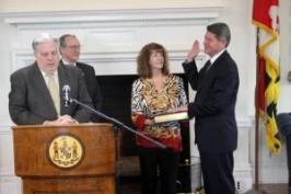 Kenneth C. Holt Jr. is sworn in as secretary of the Maryland Department of Housing and Community Development by Gov. Larry Hogan.