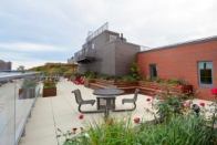 Dunn Development's Highbridge Overlook, which was completed in 2014, includes a rooftop terrace that overlooks the Harlem River and Highbridge Park in northern Manhattan.