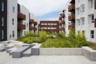 Designed by David Baker Architects, The Rivermark in West Sacramento, Calif., features a second-level podium courtyard that serves as the heart of the development. Balconies, decks, and patios surround the courtyard, which helps to blend the public and private space.