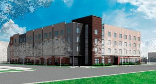 Bank of America Merrill Lynch provided a $7.5 million construction loan, an $11.3 million direct tax credit investment, and a $1 million subordinate loan to 65th Infantry Regiment Veterans Housing, creating 49 units of supportive housing in Chicago.