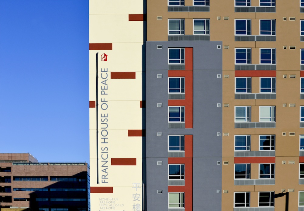 Francis House of Peace, developed by Project HOME and the Philadelphia Chinatown Development Corp., is providing permanent supportive housing for the formerly homeless, young adults, and other low-income households. Project HOME's vision, "None of us are home until all of us are home," appears on the exterior of the building.