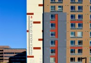 Francis House of Peace, developed by Project HOME and the Philadelphia Chinatown Development Corp., is providing permanent supportive housing for the formerly homeless, young adults, and other low-income households. Project HOME's vision, "None of us are home until all of us are home," appears on the exterior of the building.