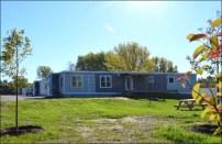McKnight Lane, a new rental community in Waltham, Vt., has replaced a blighted mobile home park that had become a brownfield from spilled fuel oil. The development is named to honor Terry McKnight, the former executive director of project co-developer Addison County Community Trust, who died unexpectedly in November 2014. He had wanted for years to transform the mobile home park.