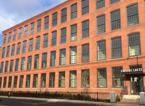 Dakota Partners has turned a former machine shop and warehouse into Capitol Lofts, a mixed-income development in Hartford, Conn.