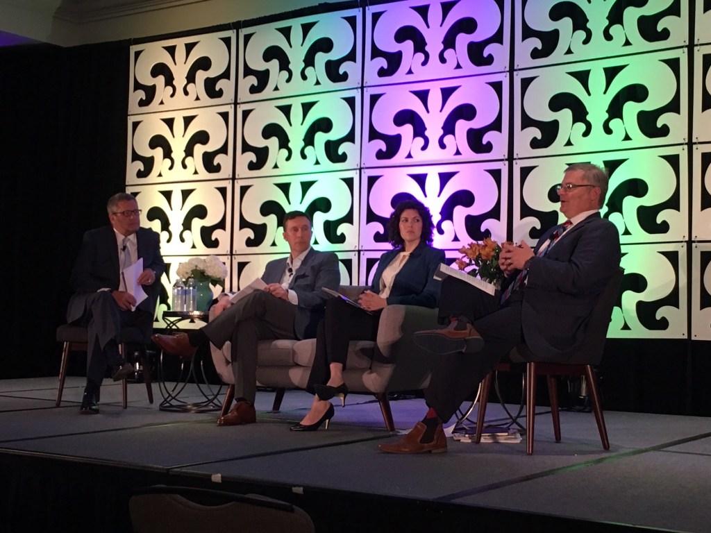 From left, Bob Moss of CohnReznick, Jeff Whiting of CREA, Emily Cadik of Enterprise Community Partners, and David Gasson of Housing Advisory Group and Boston Capital break down the latest federal news at the AHF Live Forum in New Orleans in April.