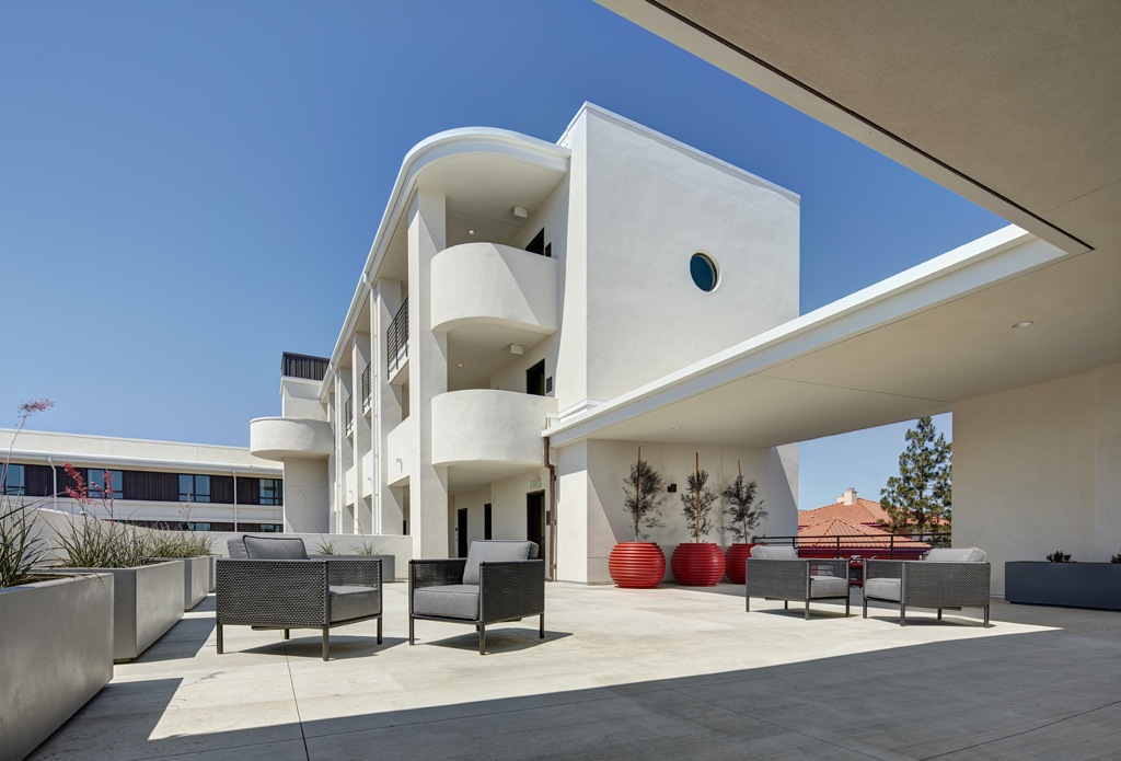 Designed by Studio E Architects and developed by Wakeland Housing and Development Corp., Talmadge Gateway in San Diego provides three stories of micro-unit residences for formerly homeless seniors.
