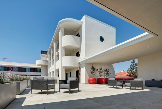 Designed by Studio E Architects and developed by Wakeland Housing and Development Corp., Talmadge Gateway in San Diego provides three stories of micro-unit residences for formerly homeless seniors.