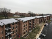 WinnCompanies installed a 651-kilowatt renewable energy facility on the roofs of Atlantic Terrace Apartments in Washington, D.C. Officials say the effort is the largest community solar project in the District.