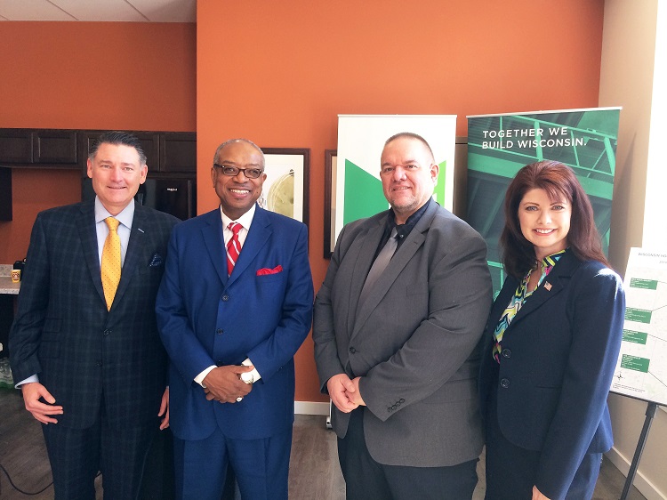 Thirty-one developments have been selected to receive low-income housing tax credits in Wisconsin. Herman & Kittle Properties and Lutheran Social Services developed Haymarket Lofts in Milwaukee, which received a LIHTC award in 2015 and was one of the sites for this year’s awards announcement. The developers have also received housing credits for a new development in Franklin. The announcement was attended by (from left) Jeff Kittle, president and CEO of Herman & Kittle Properties; Wyman Winston, executive director of the Wisconsin Housing and Economic Development Authority; Dennis Hanson, executive director for housing services/facility and asset management with Lutheran Social Services of Wisconsin and Upper Michigan; and Wisconsin Lt. Gov. Rebecca Kleefisch.