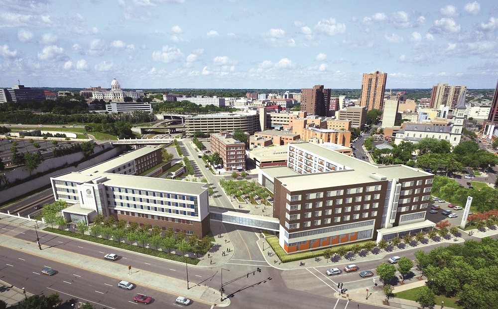 A skyway connects the new Dorothy Day Place building (right) with the first-phase building.