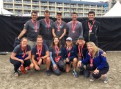 The 2018 Running for Shelter team gather at the finish line.