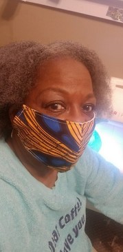 Jeliner Jordan wears one of the 250 masks she has made since the onset of COVID-19