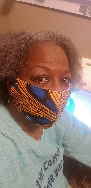 Jeliner Jordan wears one of the 250 masks she has made since the onset of COVID-19