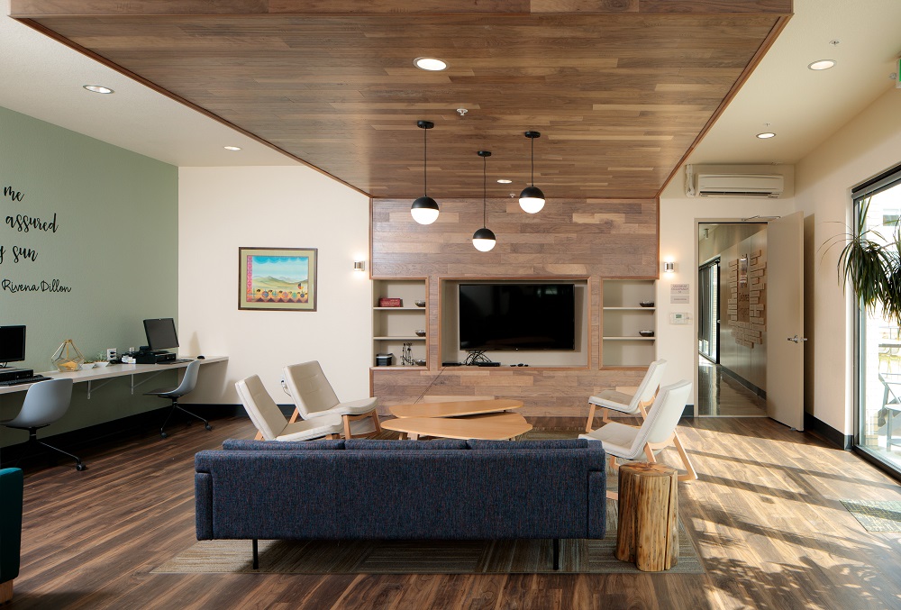 A partnership between Rocky Mountain Communities and The Delores Project, Arroyo Village features a 60-bed homeless shelter, 35 one-bedroom apartment units of supportive housing, and 95 affordable apartments. The entire property was designed by Shopworks Architecture utilizing a trauma-informed design perspective, including the use of wood and natural materials, soft lighting, and open sightlines.