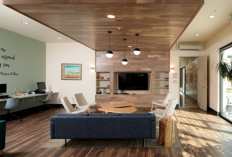 A partnership between Rocky Mountain Communities and The Delores Project, Arroyo Village features a 60-bed homeless shelter, 35 one-bedroom apartment units of supportive housing, and 95 affordable apartments. The entire property was designed by Shopworks Architecture utilizing a trauma-informed design perspective, including the use of wood and natural materials, soft lighting, and open sightlines.