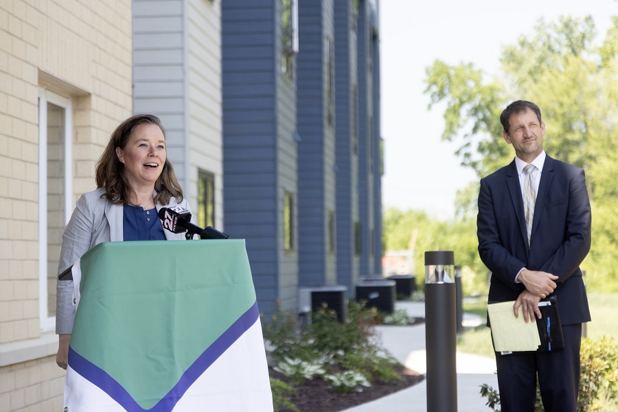 Wisconsin Lt. Gov. Sara Rodriguez celebrates the recent opening of Landsby Ridge along with developer Ted Matkom, Wisconsin market president for Gorman & Co.