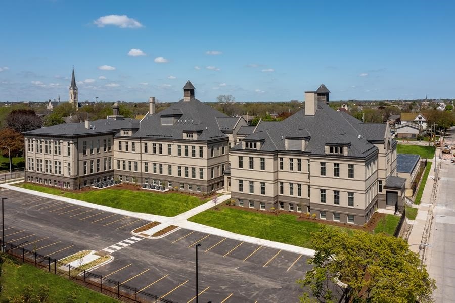 A former public school has been redeveloped into McKinley School Lofts in Milwaukee.