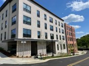 The first phase of The Terraces at Arlington View includes one studio, 14 one-, 47 two-, and 15 three-bedroom apartments. Eight homes have been set aside for Arlington County’s Permanent Supportive Housing program, which provides the opportunity for residents with disabilities to maintain their housing and pay no more than 30% of their income toward rent. Eight apartments are fully ADA accessible, and all the homes in the new building meet Universal Design standards.