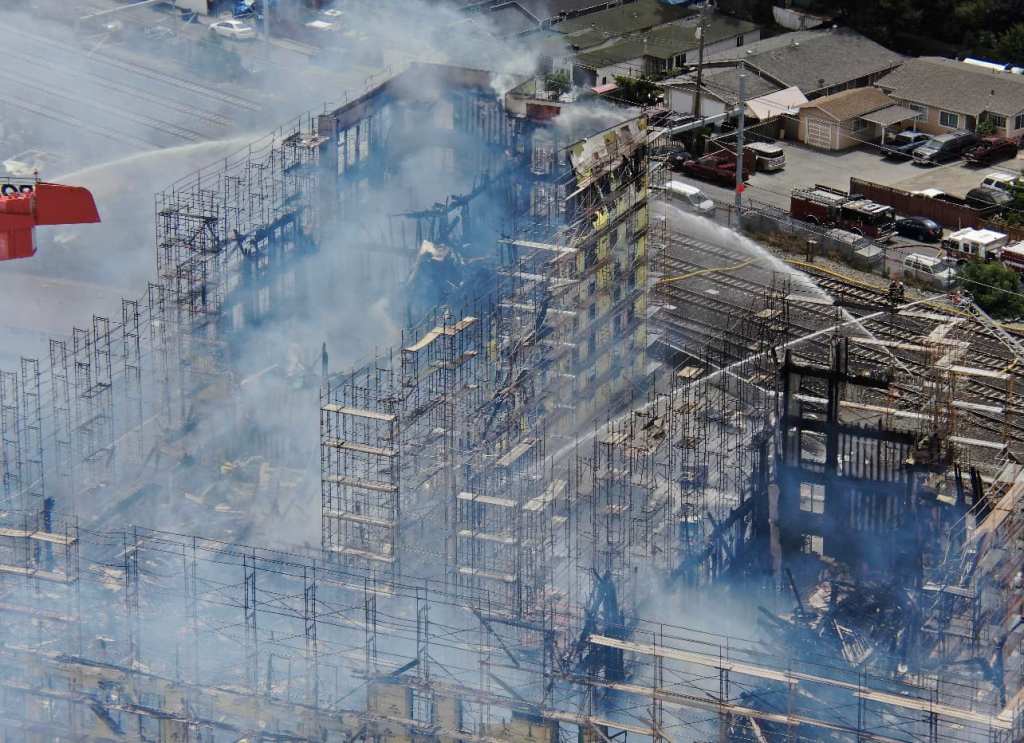 A fire devastates Middlefield Junction, an affordable housing community under construction in San Mateo County, California.