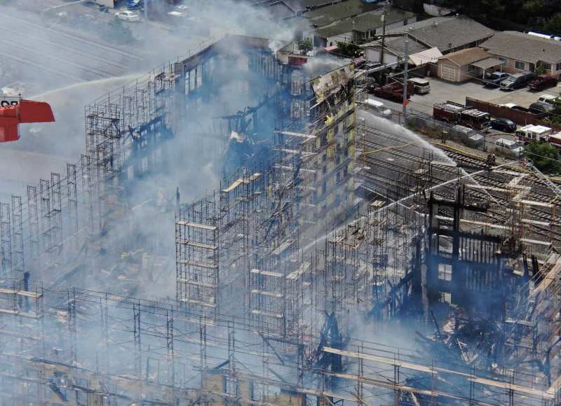 A fire devastates Middlefield Junction, an affordable housing community under construction in San Mateo County, California.