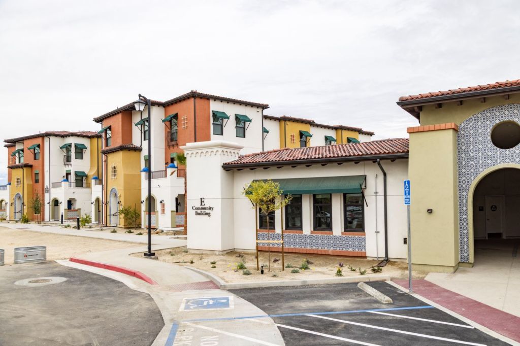 Placita Dolores Huerta brings affordable one-, two-, and three-bedroom apartments to Coachella, California. The community is developed by Community Housing Opportunities Corp. and designed by Maria Song, principal of Interactive Design Corp.