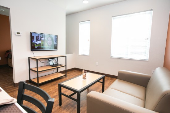 The 450-square-foot units are efficient, intentionally designed to create a cozy space that serves the basic needs of the individuals. The smaller unit sizes allow for wider hallways with private nooks and group space for resident and staff engagement and community activities.