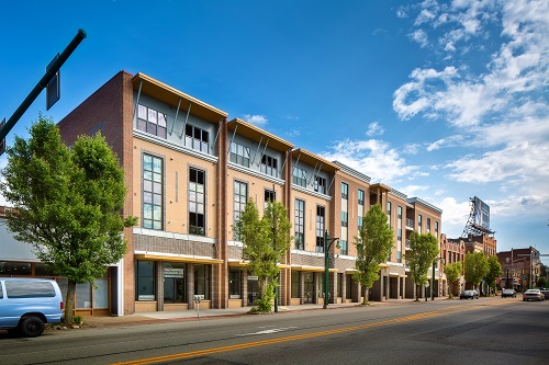 ONE Homestead is a scattered-site project involving six different buildings in close proximity.