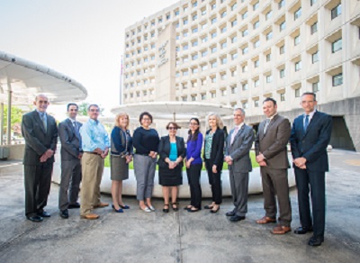The RAD team is a finalist for the prestigious Samuel J. Heyman Service to America Medal, also known as the "Sammie." Several of the team members are pictured in front of the HUD headquarters in Washington, D.C.