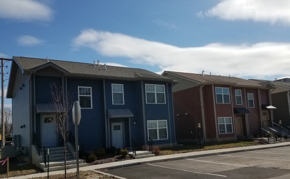 In addition to the redevelopment of a vacant three-story building, The Mercantile adds three two-story duplexes on the block.