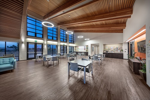 A community room is part of Paradise Creek Apartments, where residents have access to a wide range of residents services, including financial fitness and homeownership training.