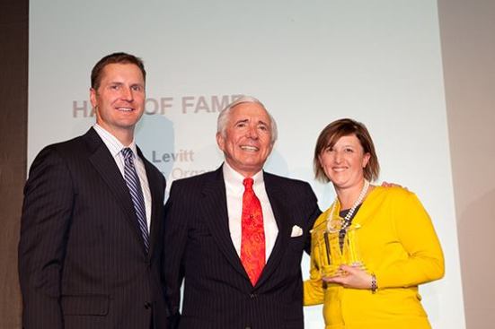 Affordable Housing Hall of Fame inductee Michael Levitt (center), founder of The Michaels Organization, with Christine Serlin, executive editor of Affordable Housing Finance, and David Leopold, senior vice president of Bank of America Merrill Lynch.