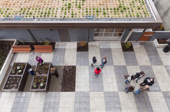 The project was designed to achieve Washington's Evergreen Sustainable Development Standards and includes many green building elements for residents to enjoy. The courtyard features raised planters for residents to grow fruits and vegetables two bio-retention planters, benches, and small trees. 