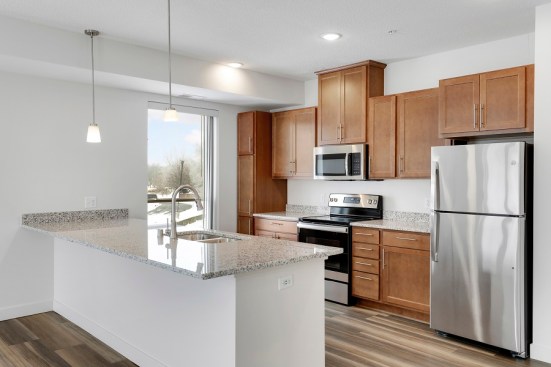 Units at Spring House Apartments have high-quality interior finishes such as granite countertops, stainless steel appliances, in-unit washers and dryers, and vinyl-plank flooring.