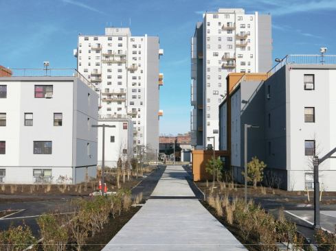 Made up of 11 buildings, the project features 1,093 apartments ranging in size from studios to five-bedroom units. Developers used the federal Rental Assistance Demonstration program to convert many of the apartments to a new project-based Sec. 8 contract.