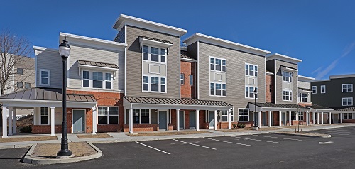 Every residential unit has its own front door and covered entrance to the street.