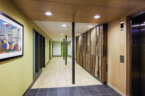 A model for turning old SRO hotels in supportive housing, Buffett Place features 51 studio apartments reserved for residents earning no more than 30 percent, 50 percent, and 60 percent of the area median income.