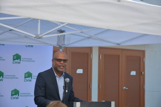 Community HousingWorks president and CEO Sean Spear speaks at the ribbon-cutting ceremony for Las Haciendas Apartments.