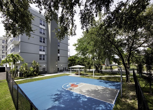 It's a slam dunk that Courtside Apartments, co-developed by basketball great Alonzo Mourning's AM Affordable Housing and the Housing Trust Group, would have a basketball court.