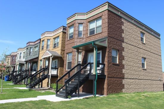 The greystones are modeled after Chicago's unique architectural style of housing, with narrow widths and extended lengths. The new greystones blend in well with Des Moines' older housing stock from the early 1900s.