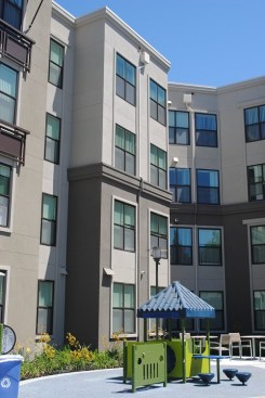 Valor Crossing residents can enjoy an interior courtyard complete with  playgrounds and gardens.