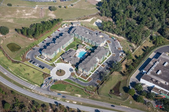 Residents have access to surrounding services and retail. The site is adjacent to a shopping center anchored by a Publix grocery store that residents can walk to.  A bus stop also was added to the development to aid the seniors. 