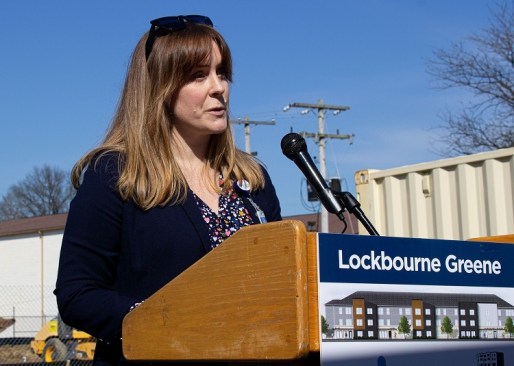 Gretchen West, executive director of Healthy Homes, speaks at the Lockbourne Greene groundbreaking in Columbus, Ohio. Health Homes and Woda Cooper Cos. are developing the 60-unit affordable housing community.