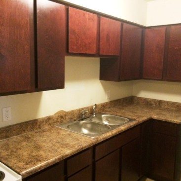 Interior improvements to the units include kitchen and bath upgrades with new cabinetry, countertops, and flooring.