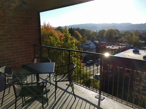 The upper floors of Hawthorne East Apartments have views of the city. The property's desirable location made it a target for market-rate conversion.