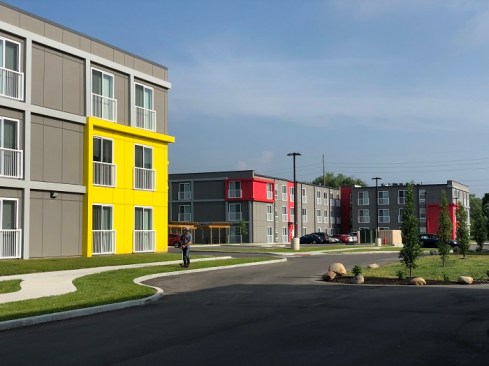 The $18.4 million Monon Lofts, which replaced a blighted warehouse, helps meet the neighborhood's redevelopment goals.