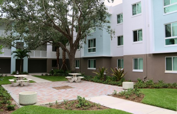 The redevelopment's green building and LEED initiatives have resulted in more efficient units, reducing costs and increasing the quality of life for residents.