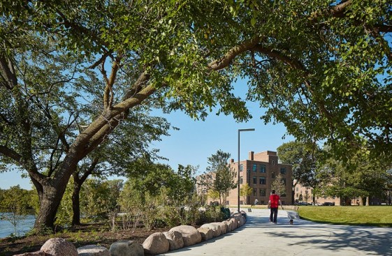 The reimagined outdoor space at Lathrop is designed by award-winning landscape architecture firm Michael Van Valkenburgh Associates and includes a pedestrian riverwalk.